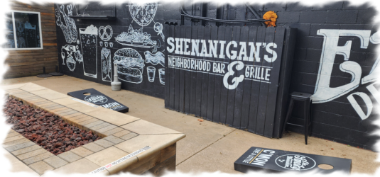 firepit and cornhole boards